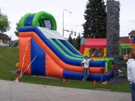 Inflatable slide side shot